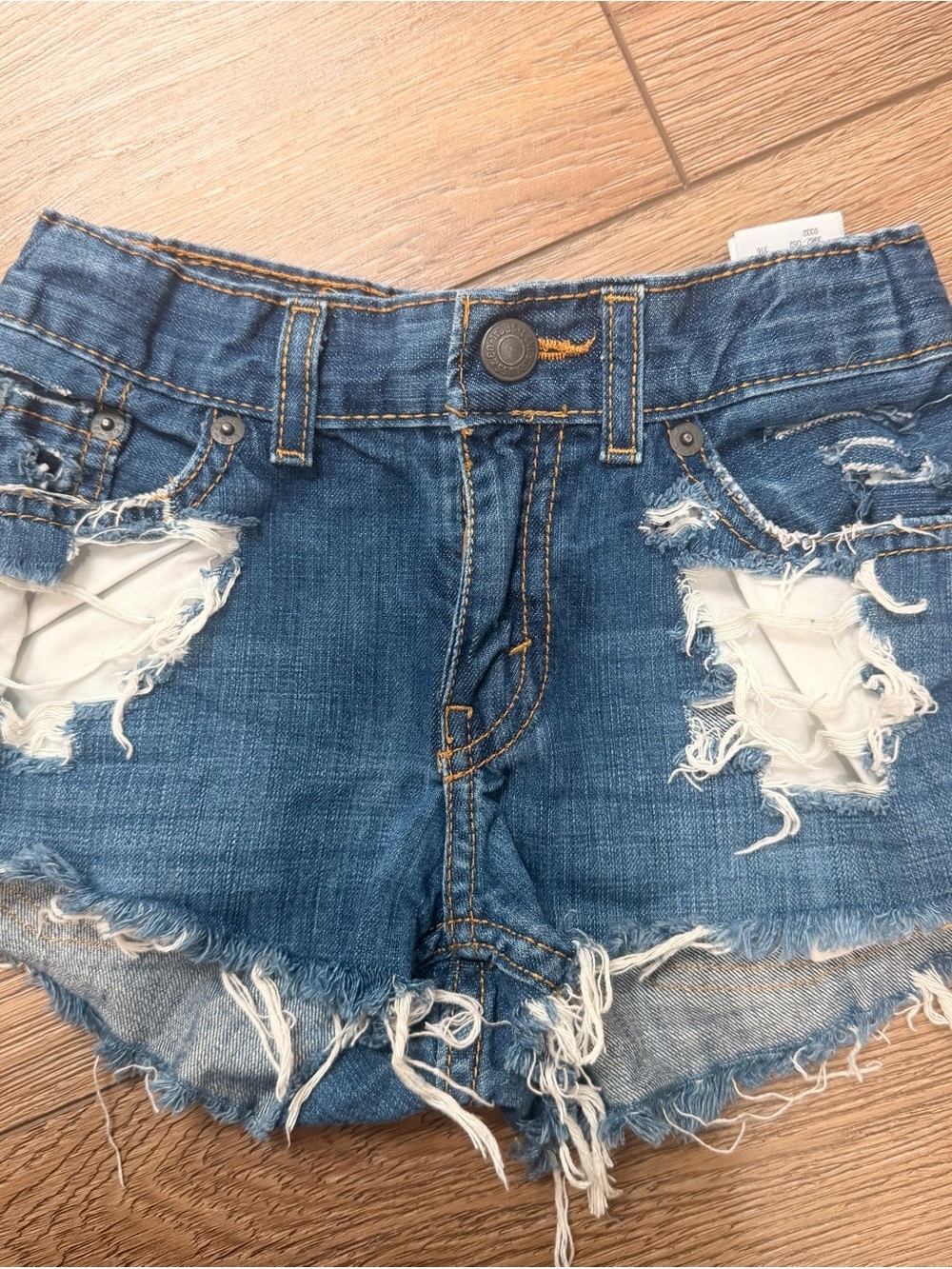 Levi's custom distressed Ripped Denim Cutoff Shorts in Blue